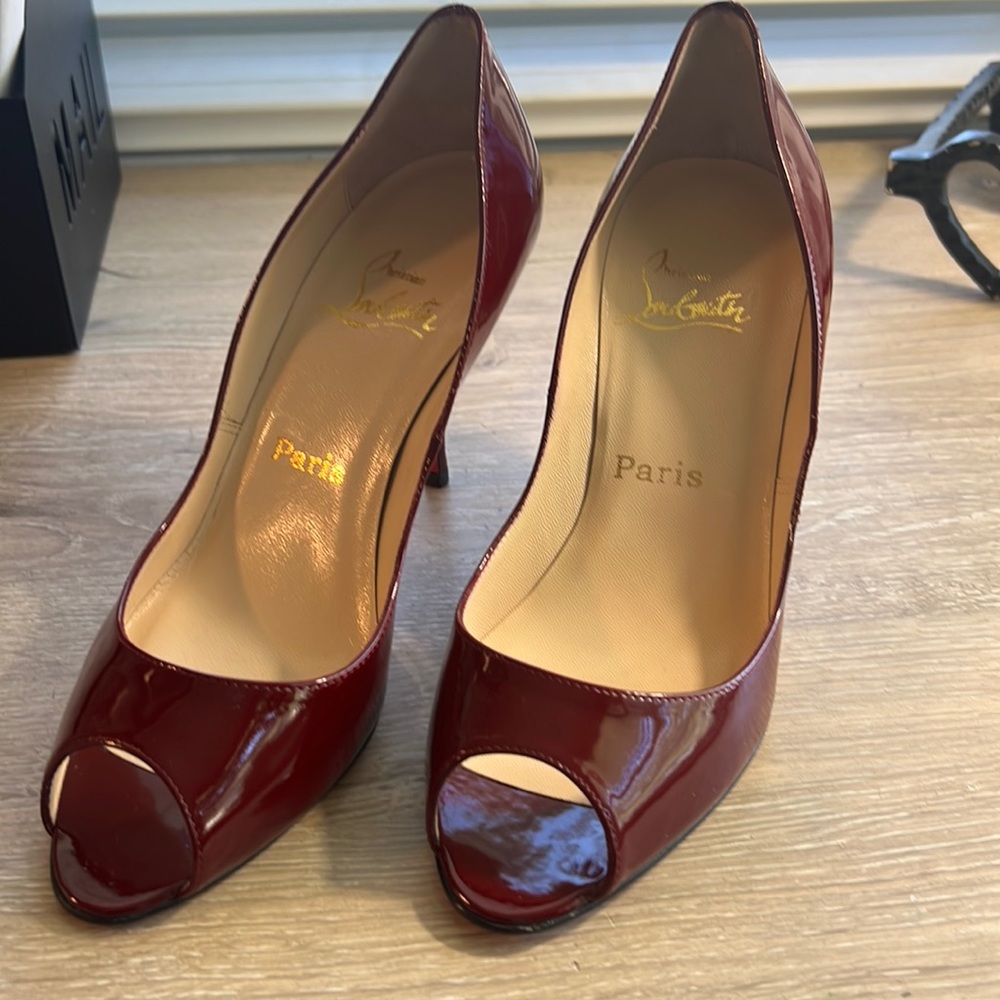 Christian Louboutin pumps.
